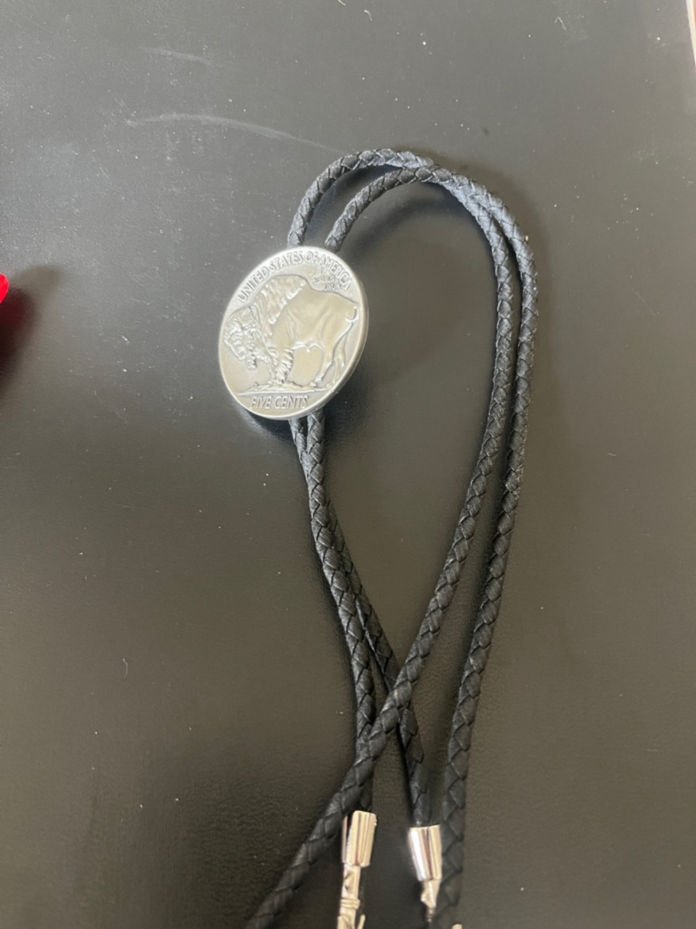Men's Black Braided Leather Bolo Tie with Silver Buffalo Slide